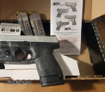 Smith and Wesson M&P Shield Gen 1 9mm with Stainless Steel Silver Slide [great condition]